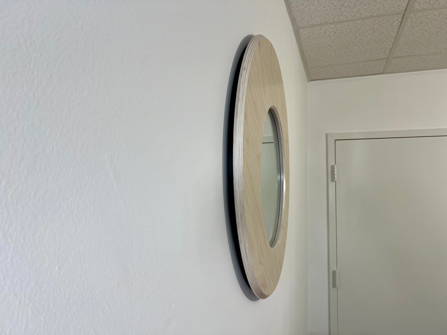 FROST — 30” Asymmetrical Round Mirror